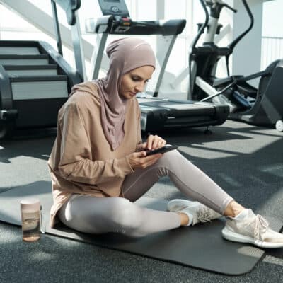 woman using smartphone in gym 2022 01 18 23 51 48 utc 400x400 - For Clients