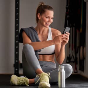 sportswoman using cellphone in gym 2022 10 13 19 15 01 utc 300x300 - Property Managers